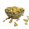 Nuts For Wellness Glass bowl filled with pistachios on a white background