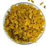 Nuts For Wellness Glass bowl filled with yellow raisins on a white background
