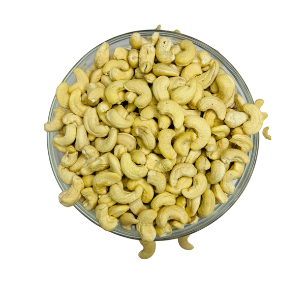 Nuts For Wellness Glass bowl filled with cashews on a white background