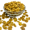 Nuts for Wellness Glass bowl filled with walnuts on a white background