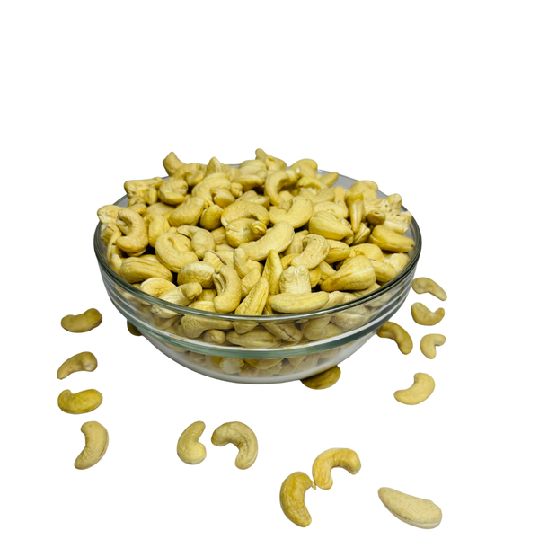 Nuts For Wellness Glass bowl filled with cashews on a white background