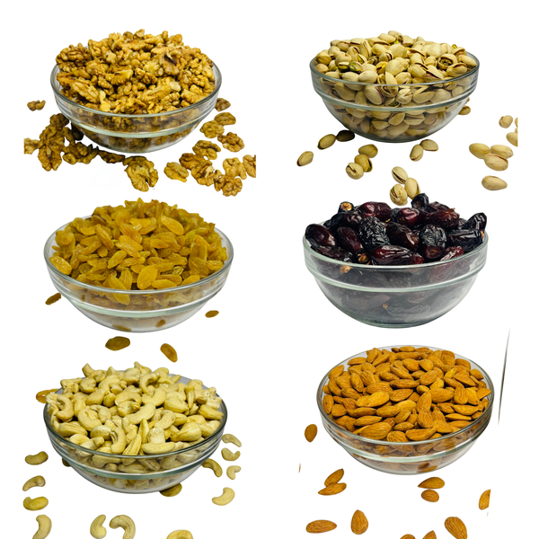 Nuts for wellness Assorted dried fruits and nuts in glass bowls on a white background