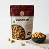 Nuts For Wellness Cashew 500g Bag of premium cashews with a bowl of cashews on a white background