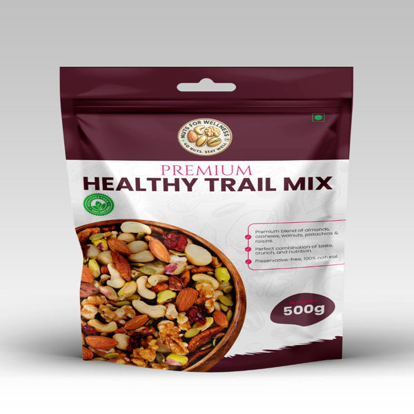 Package of premium healthy trail mix with a bowl of mix on a gray background