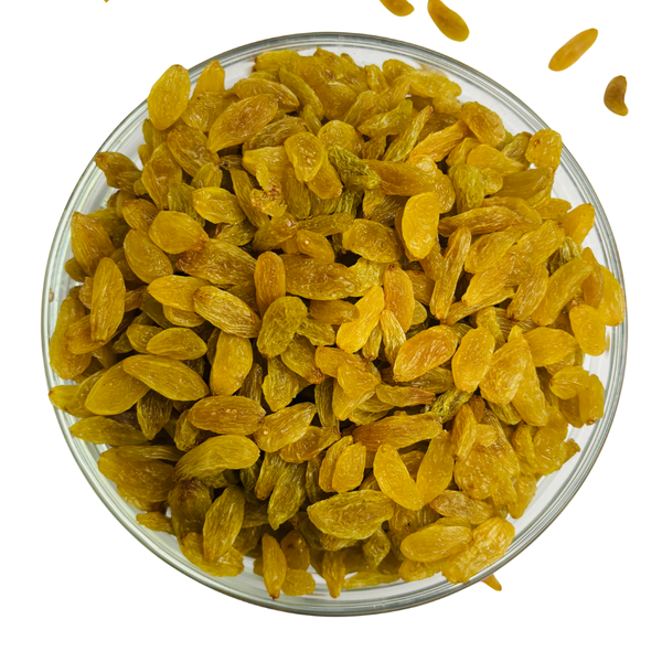 Nuts For Wellness Glass bowl filled with yellow raisins on a white background