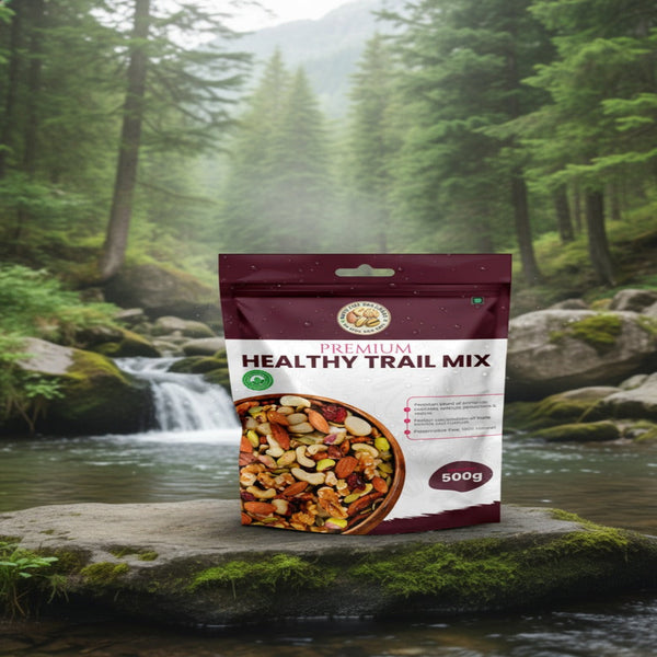 Package of premium healthy trail mix on a rock with a forest background